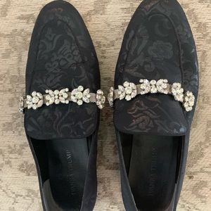 Black patterned loafers